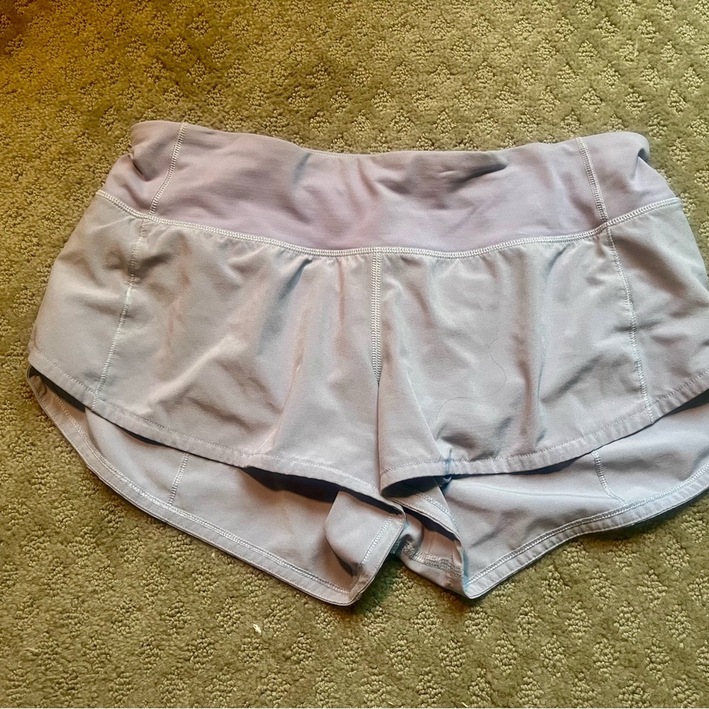 Lululemon lavender speed up shorts. Size 4 2.5" length. Light lilac color.